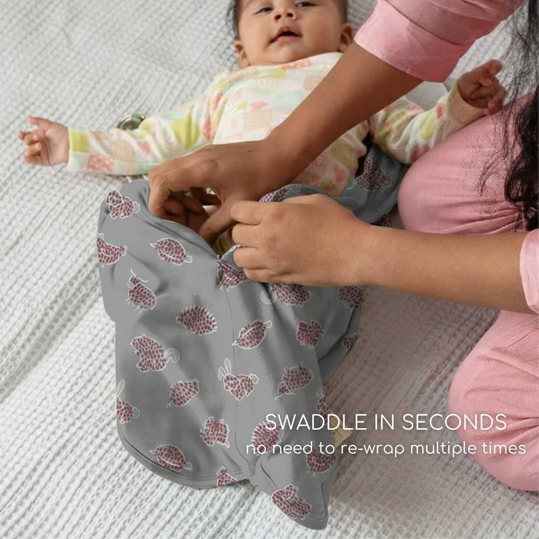 bamboo hands up swaddle pod for baby - prints