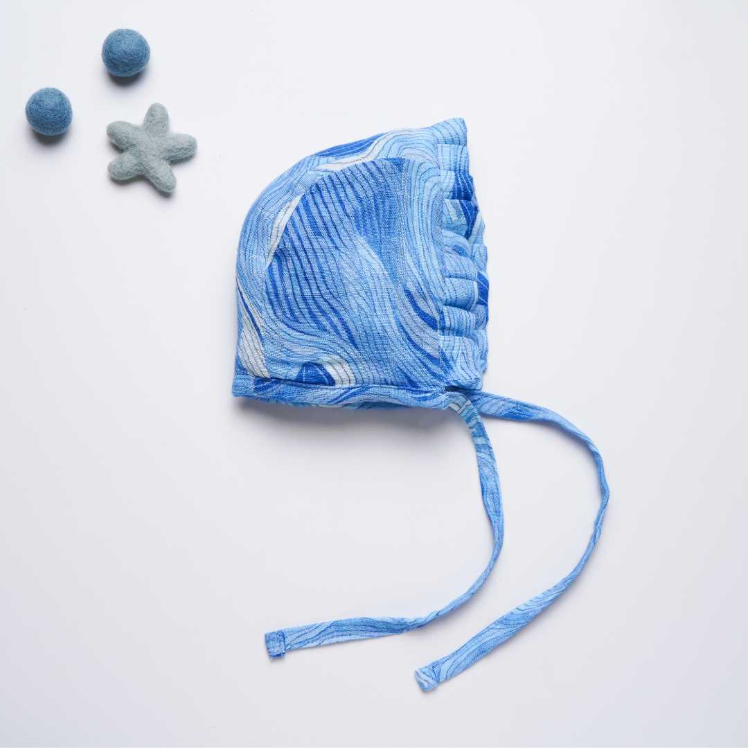newborn bamboo muslin bonnet cap - abstract world