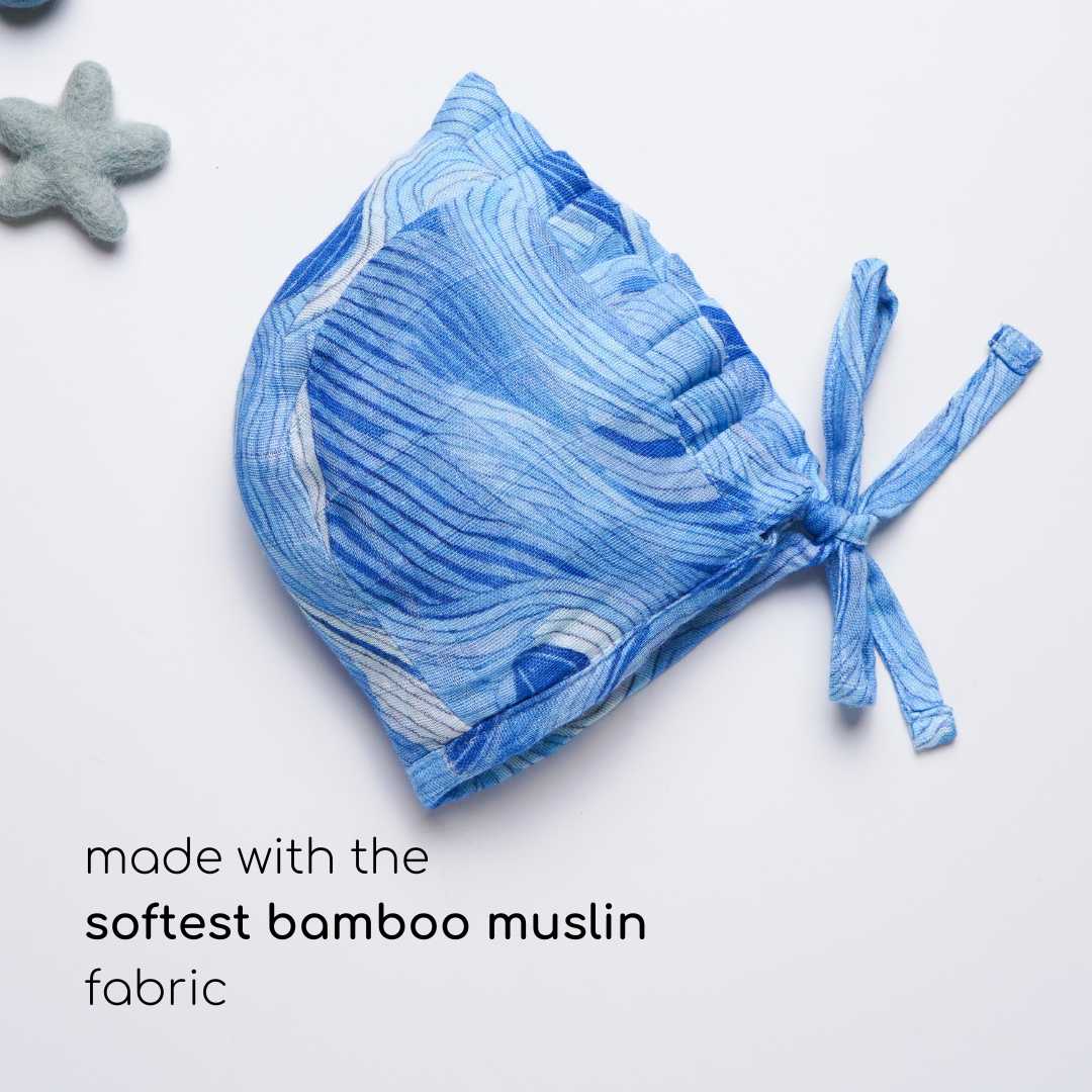 newborn bamboo muslin bonnet cap - playful patterns