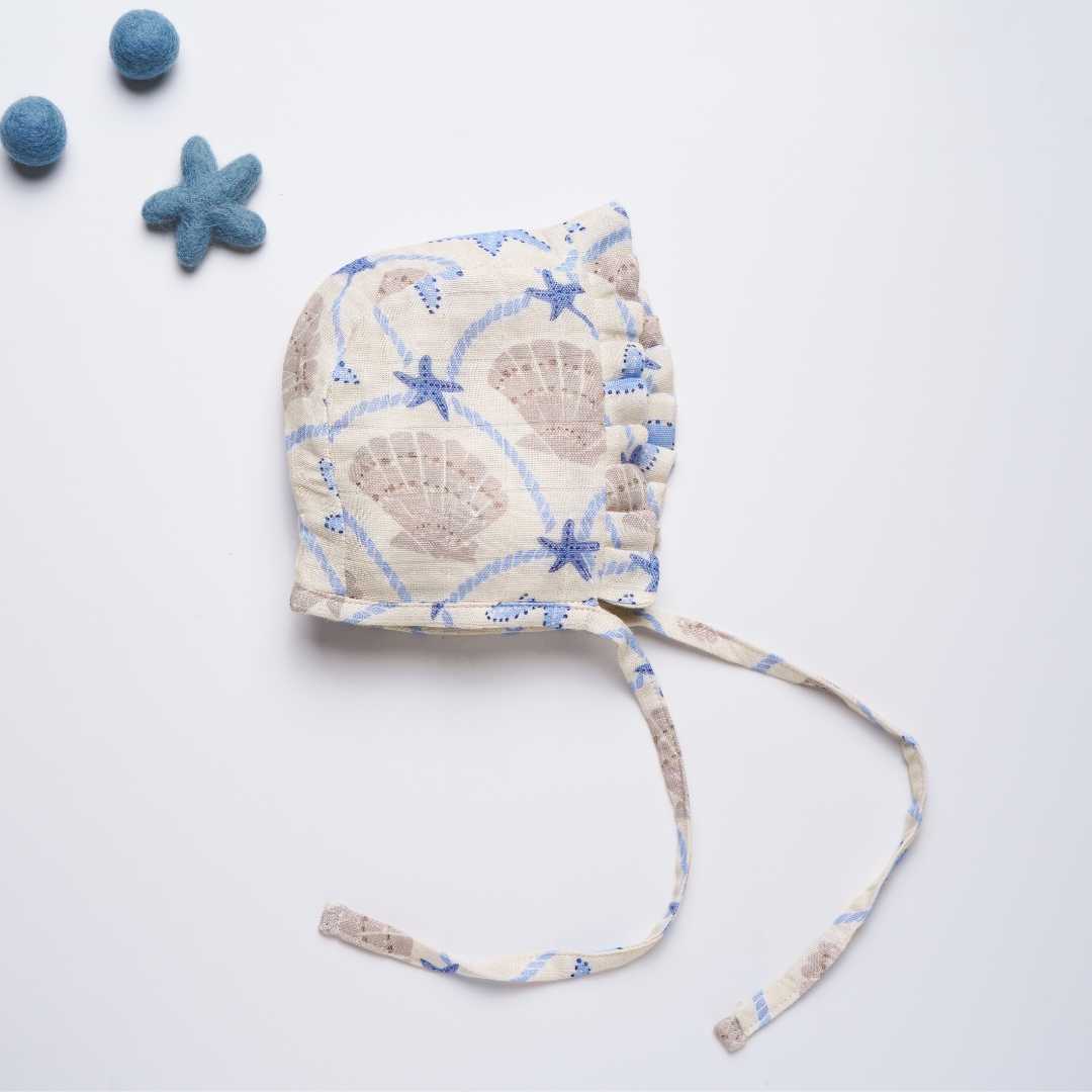 newborn bamboo muslin bonnet cap - by the sea