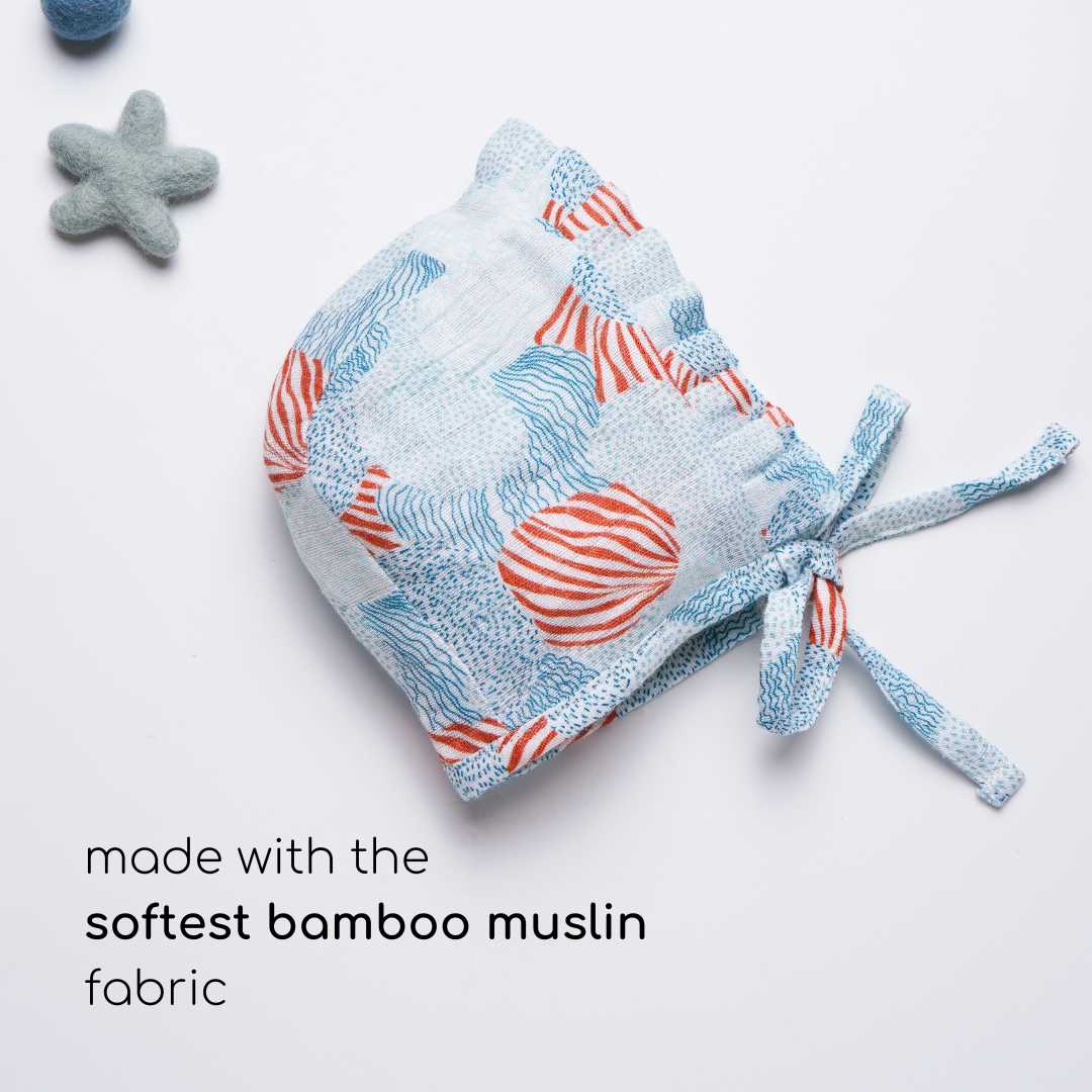 newborn bamboo muslin bonnet cap - playful patterns