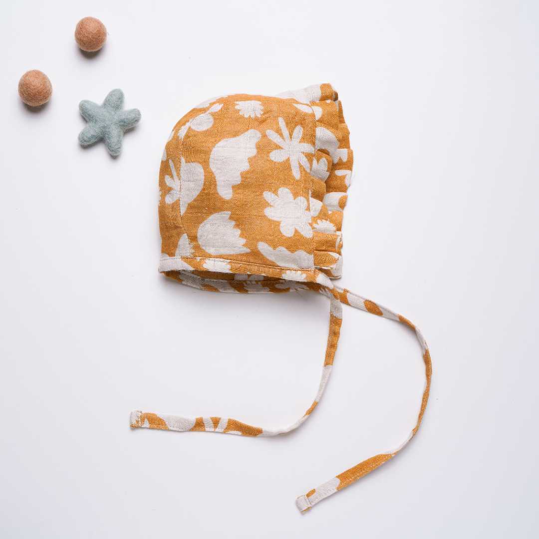 newborn bamboo muslin bonnet cap - enchanted garden