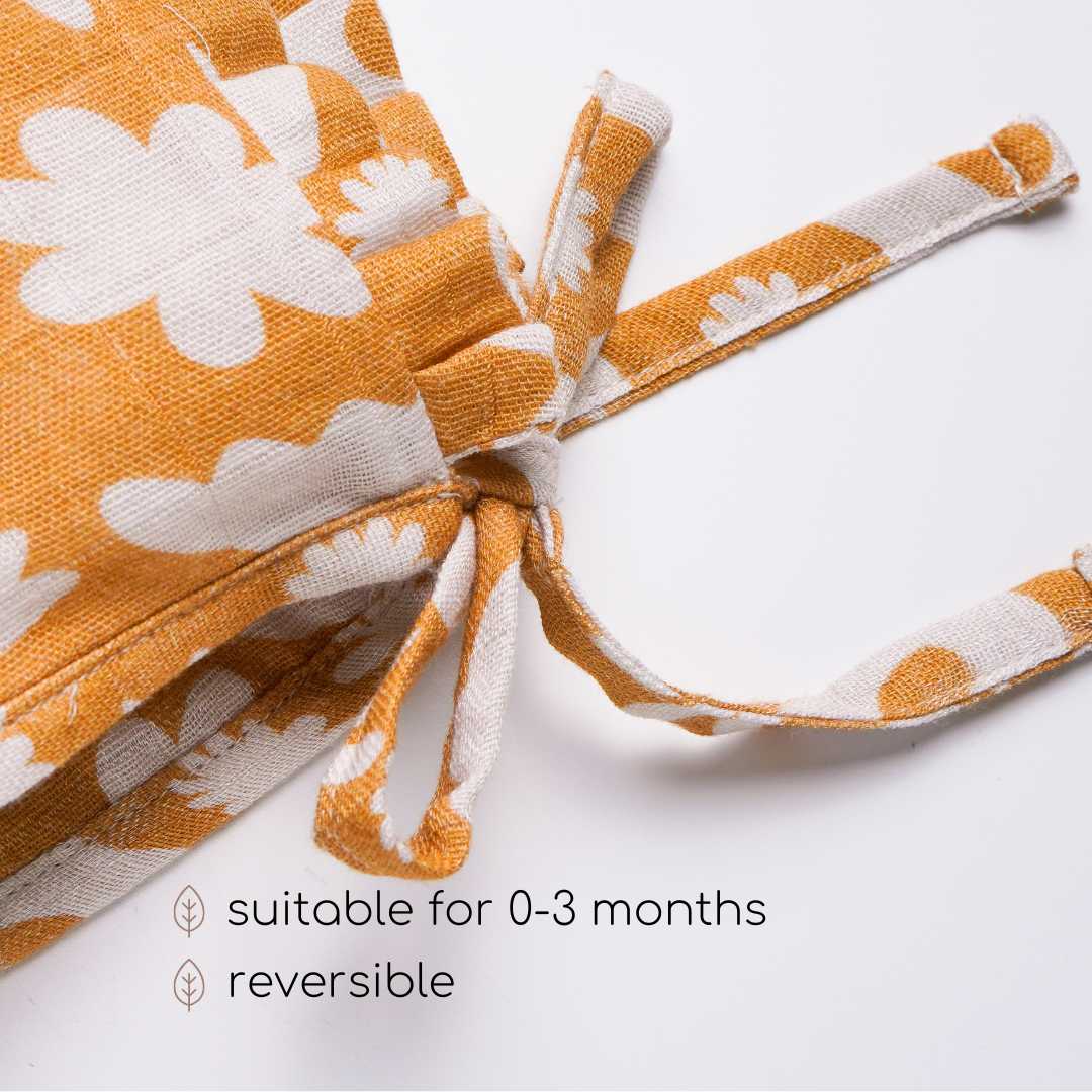 newborn bamboo muslin bonnet cap - enchanted garden