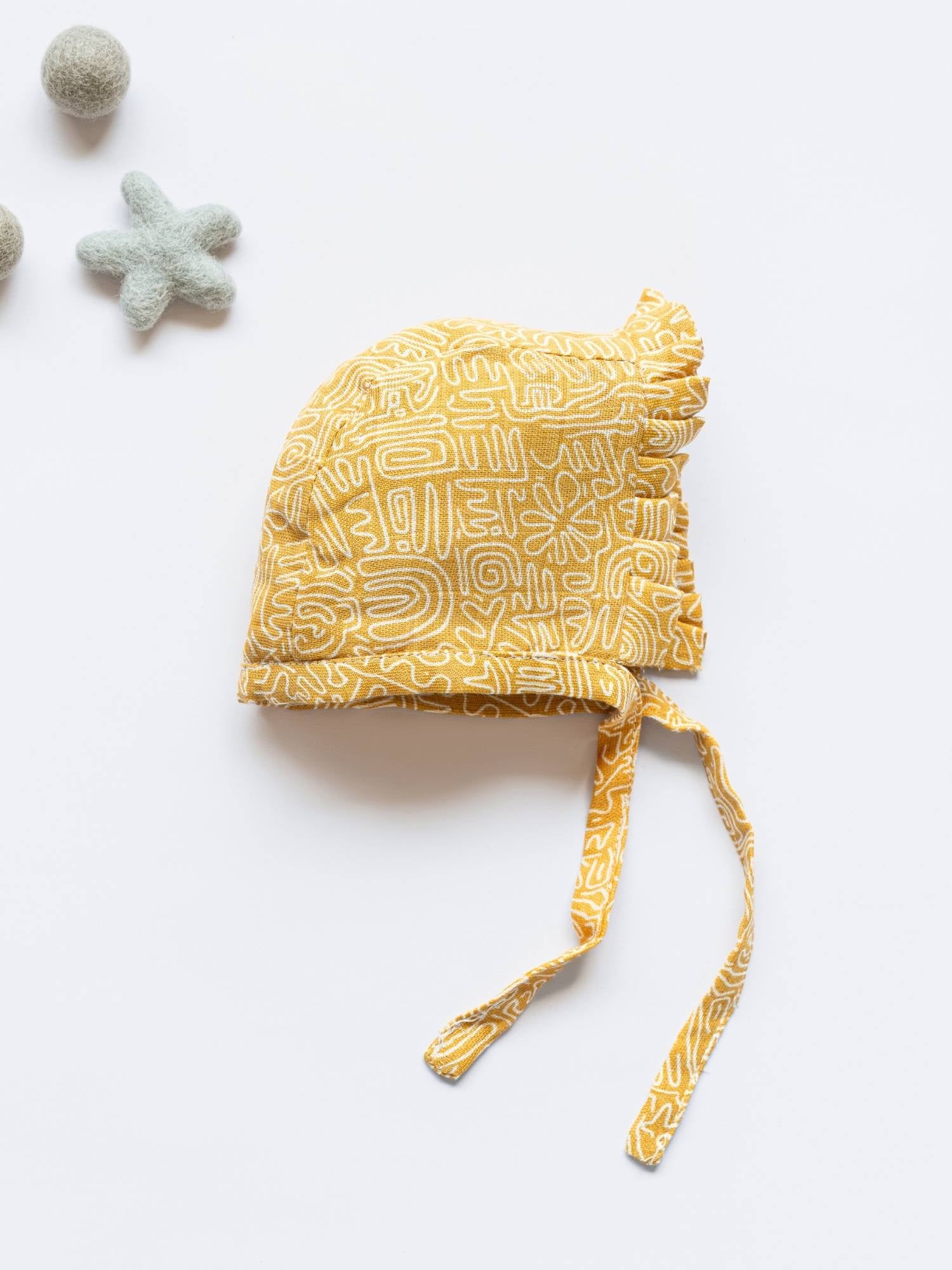 newborn bamboo muslin bonnet cap - abstract world