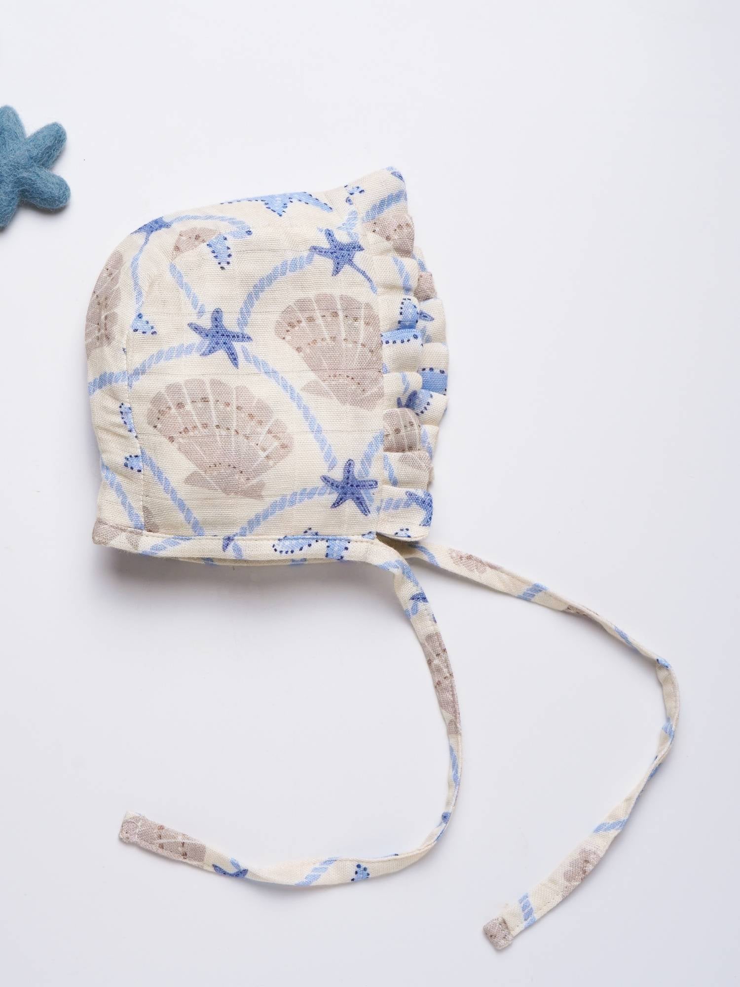 newborn bamboo muslin bonnet cap - by the sea