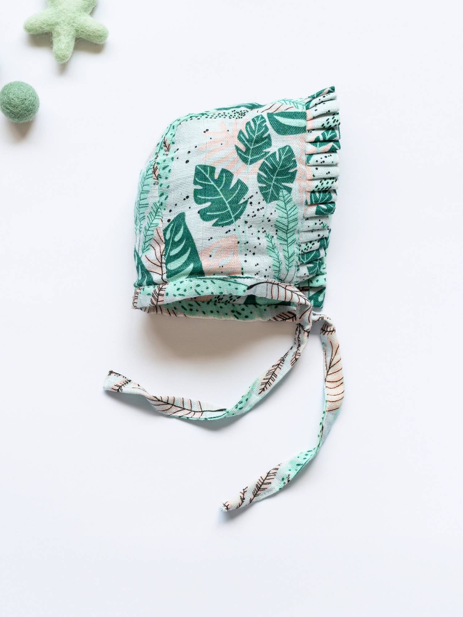 newborn bamboo muslin bonnet cap - enchanted garden