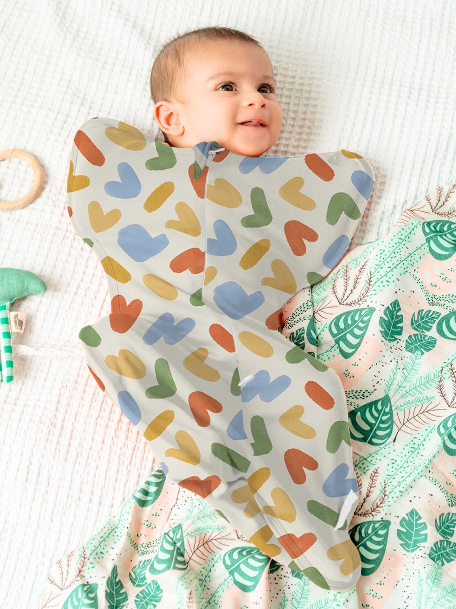 bamboo hands up swaddle pod for baby - prints