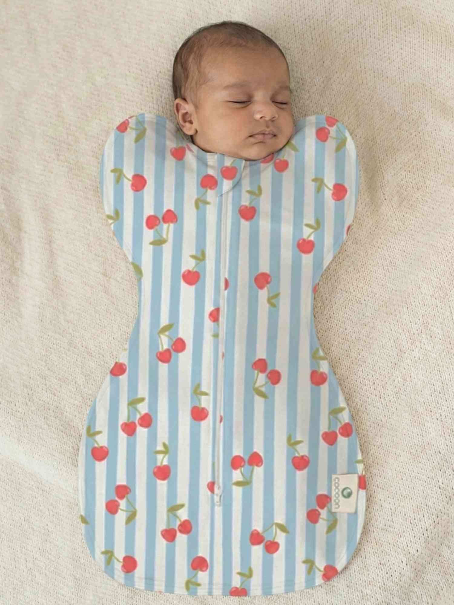 bamboo hands up swaddle pod for baby - prints