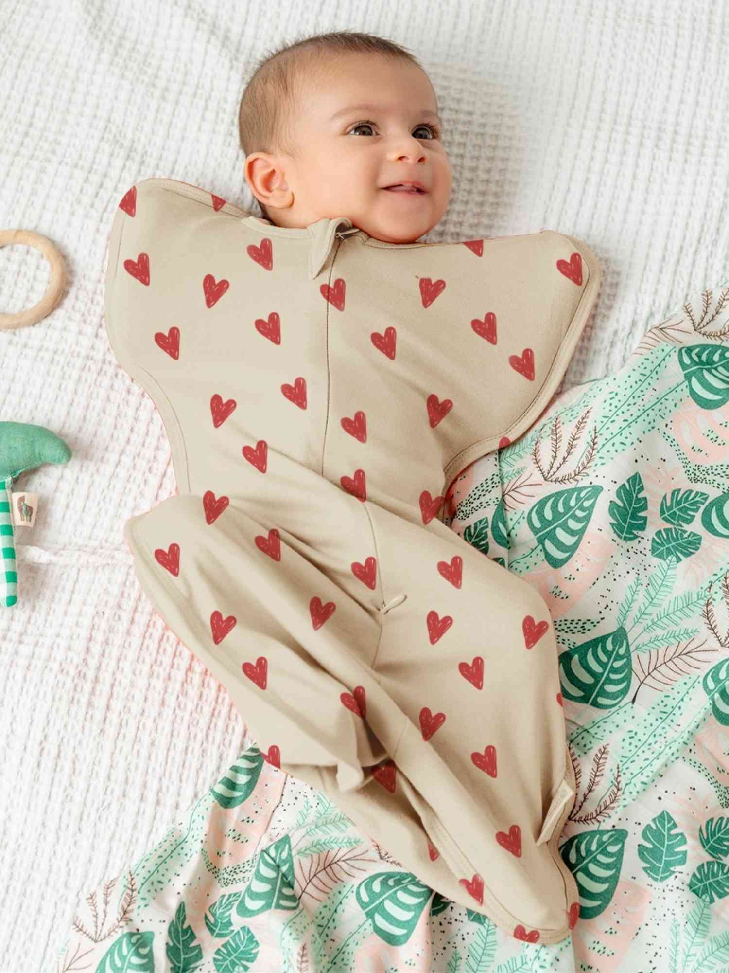 bamboo hands up swaddle pod for baby - prints