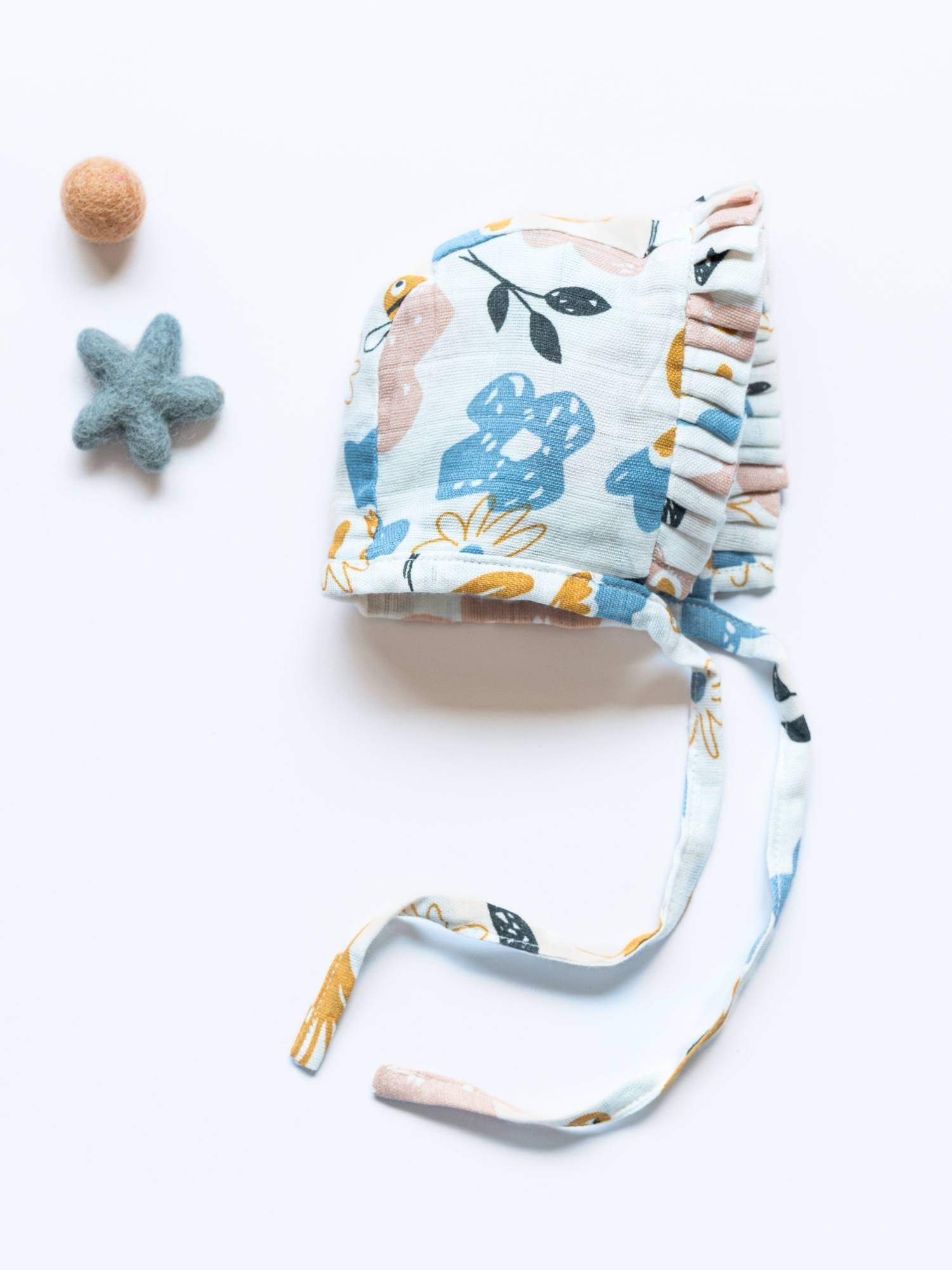 newborn bamboo muslin bonnet cap - enchanted garden