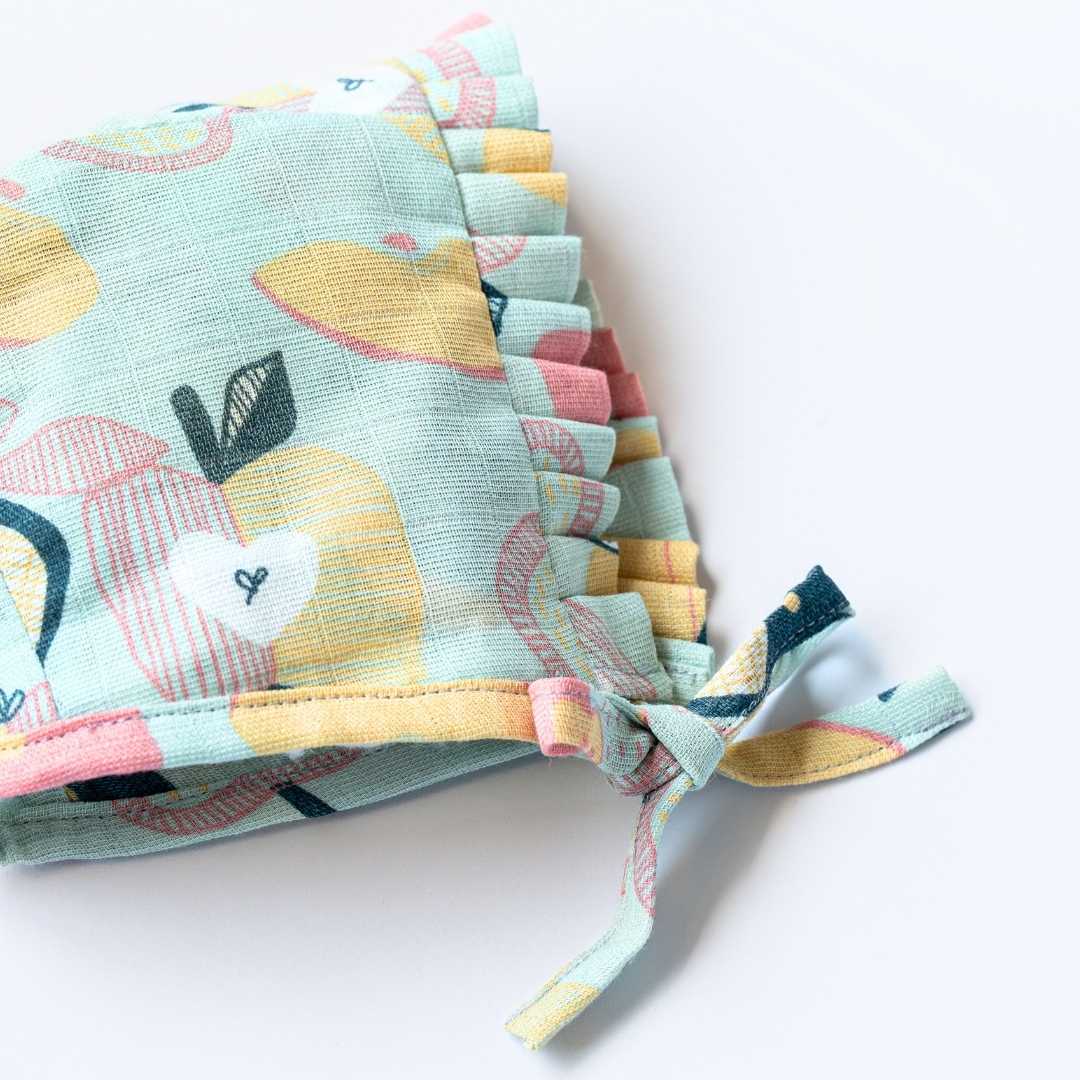 newborn bamboo muslin bonnet cap - playful patterns