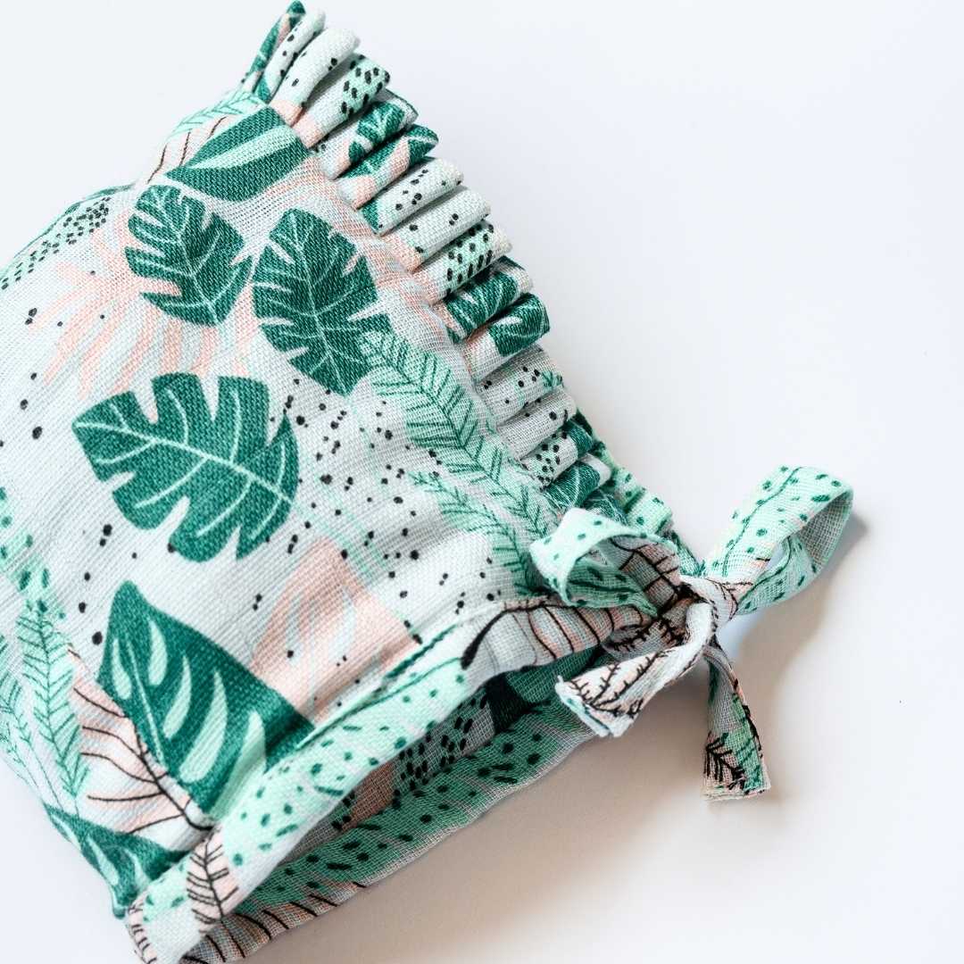 newborn bamboo muslin bonnet cap - enchanted garden