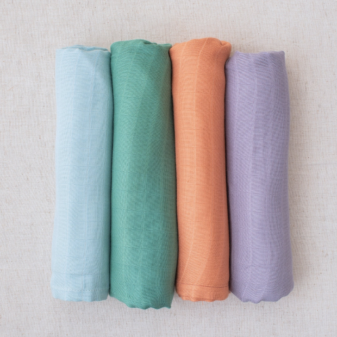 Solid color muslin sales swaddle